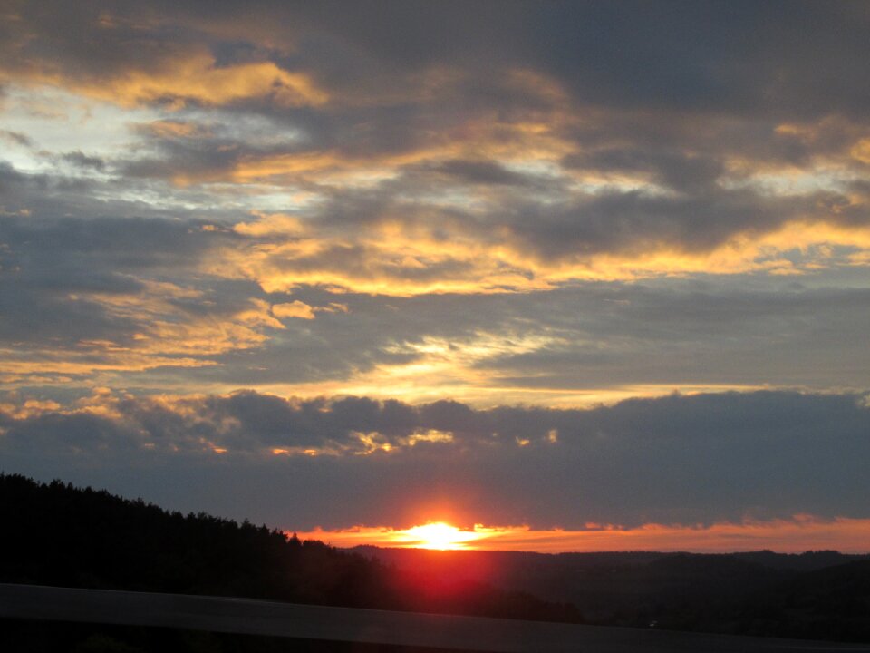Setting sun clouds orange