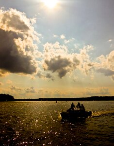 Water ship dark clouds photo