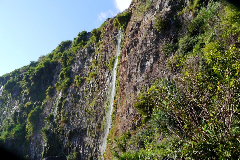 Waterfall cliffs sea