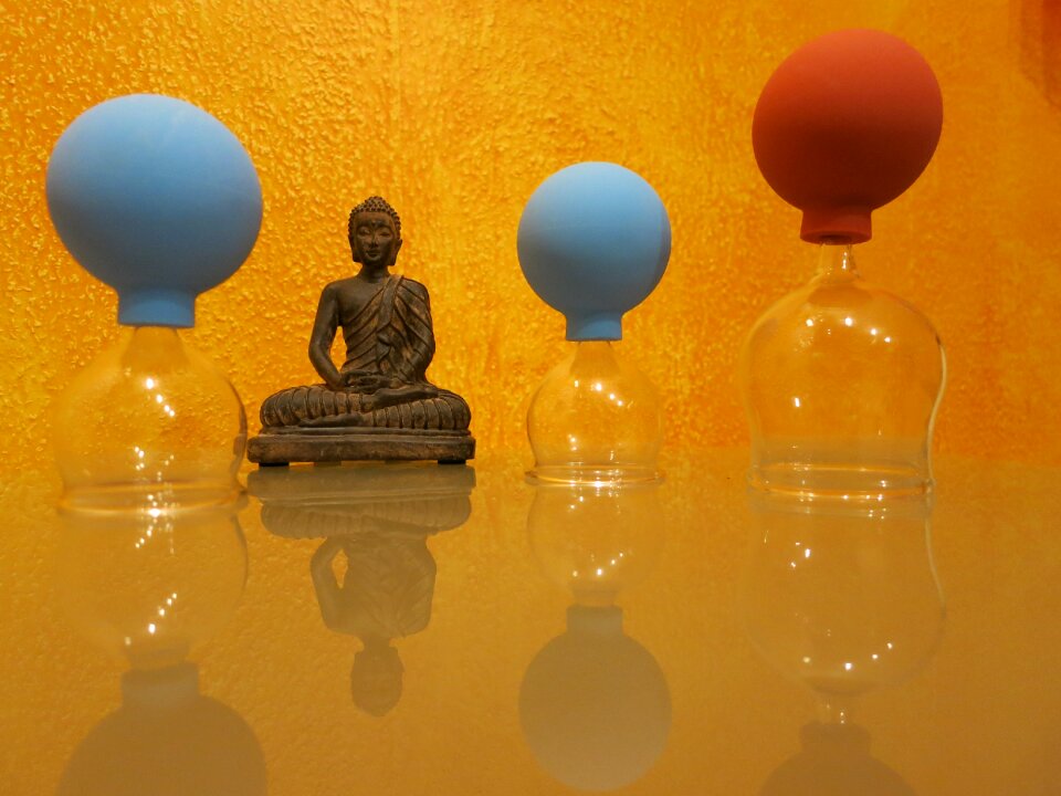 Glasses piston buddha