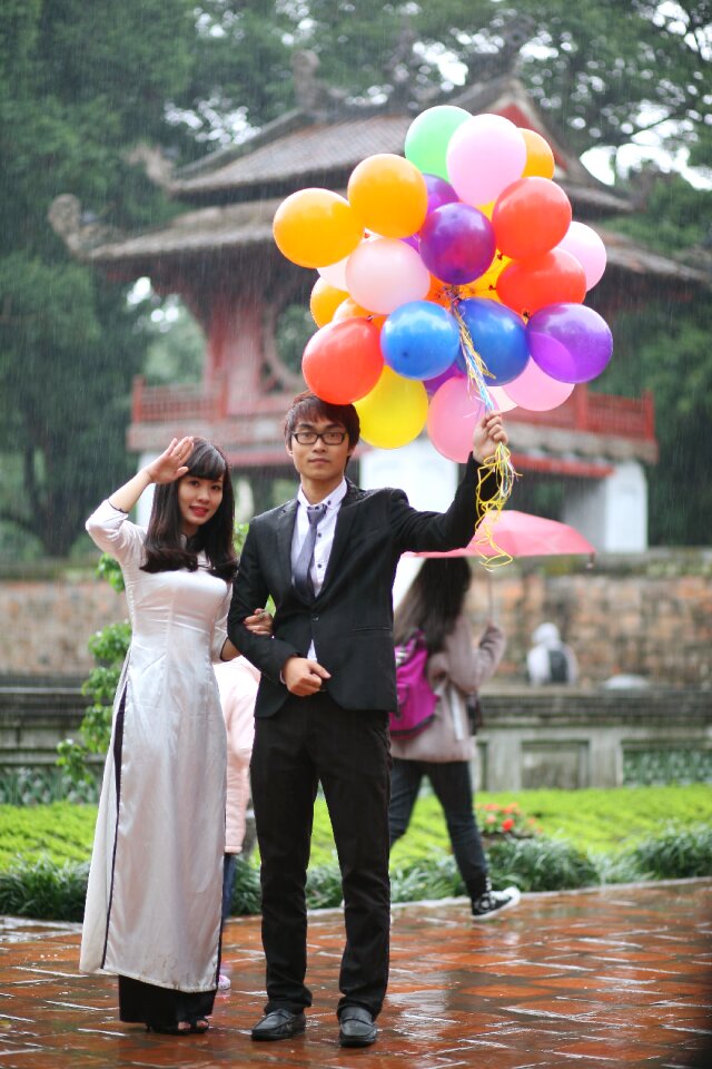 Asian balloons woman