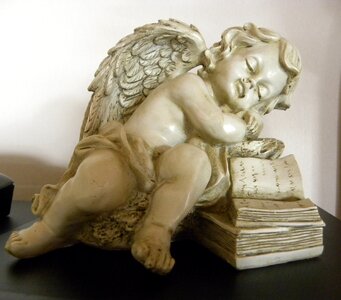 Stone figure sleeping christianity