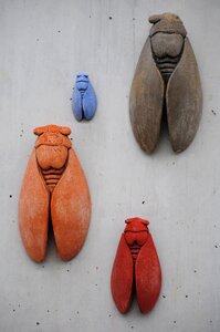Clay figures painted ochre colours photo