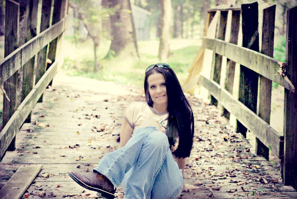 Sitting jeans outdoors