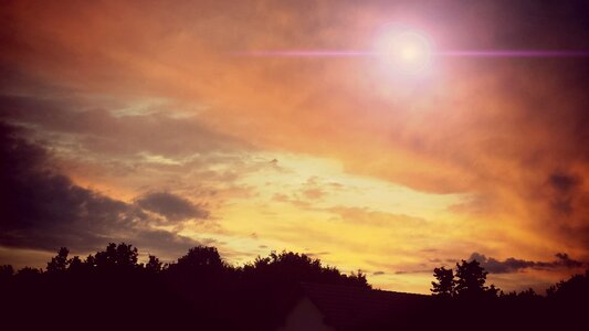 Clouds evening sky lens flair