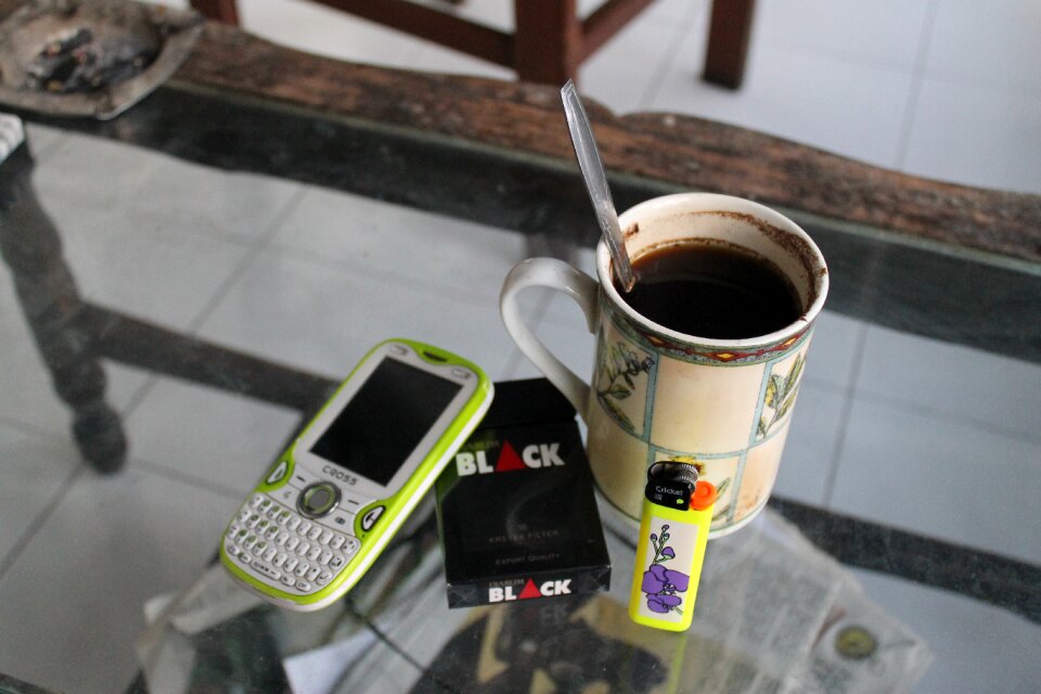 Cigarettes lighter glass table