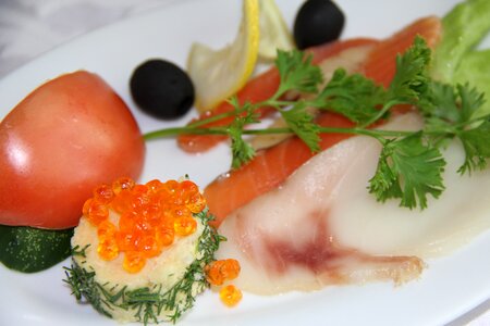 Salmon olives tomatoes