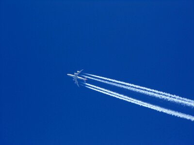 Travel jet contrails photo