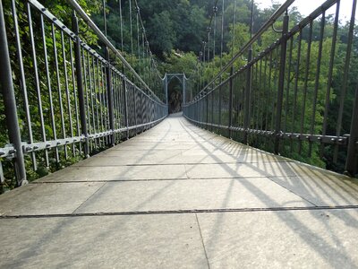 Rope bridge railing pedestrian bridge photo