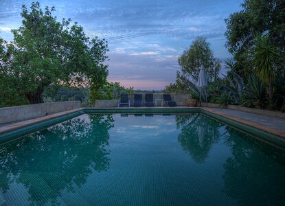 Evening swimming pool hotel complex