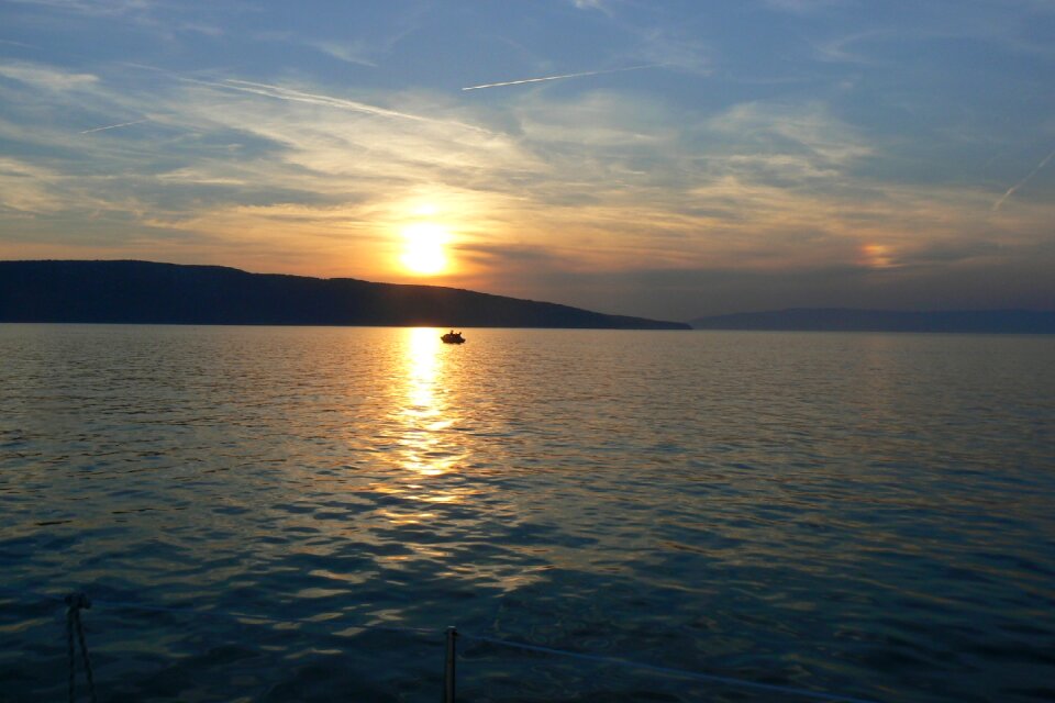 Mirroring boat lonely