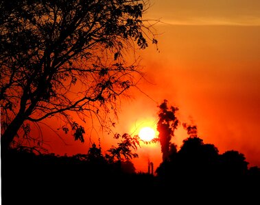 Sunset against light pollution photo