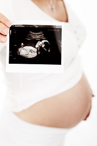 Child expectant female photo