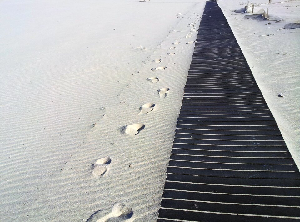 Sand path footprints in the sand