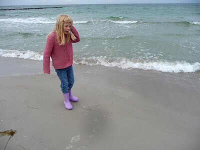 Rubber boots beach play photo
