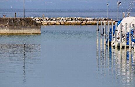 Harbour wall stone wall mirroring photo