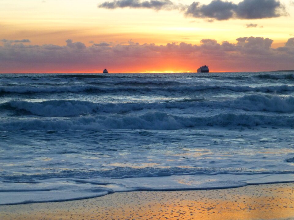Beach boats sunset