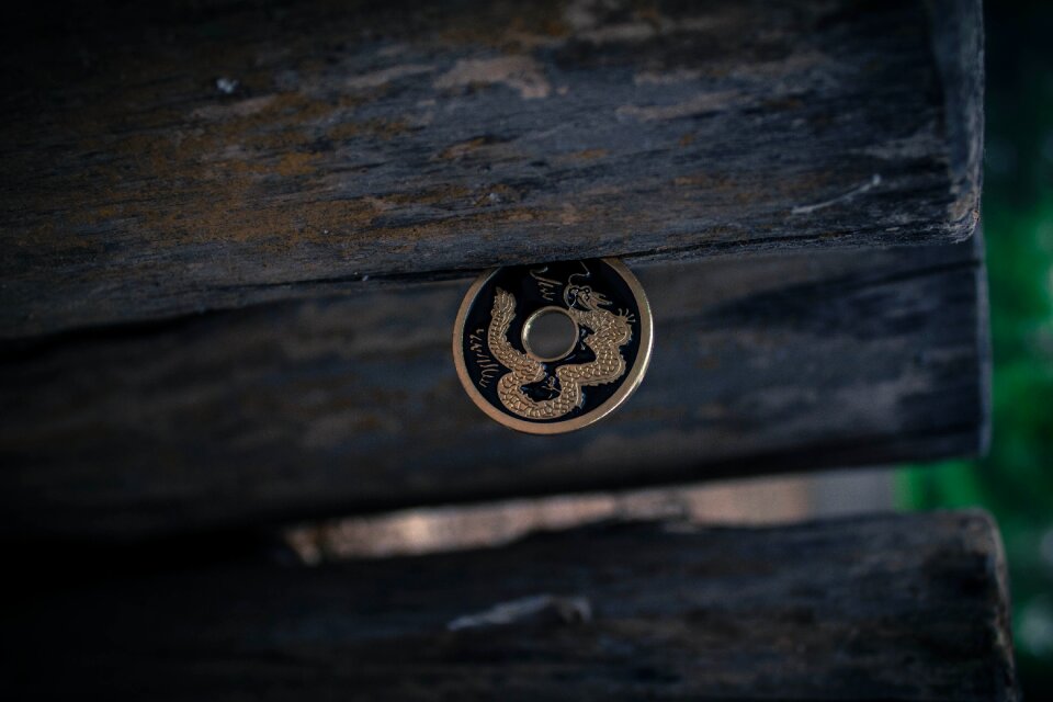 Ancient coins wood grain retro