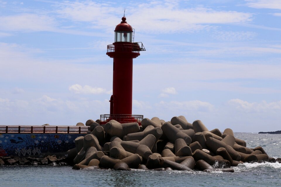 Jeju island red lighthouse blue sky
