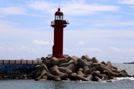 Jeju island red lighthouse blue sky