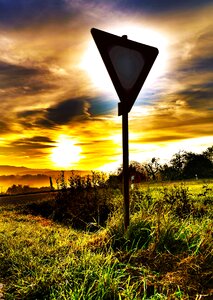 Backlighting sunset traffic sign photo