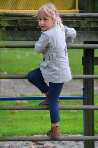 Girl climbing children's playground