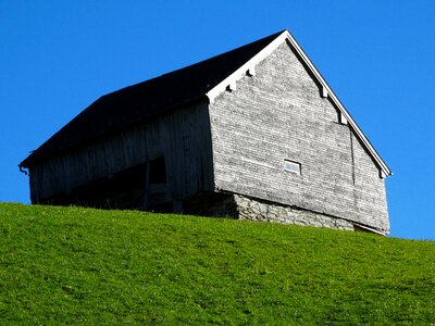 Green meadow berghäuser alpwirtschaft photo