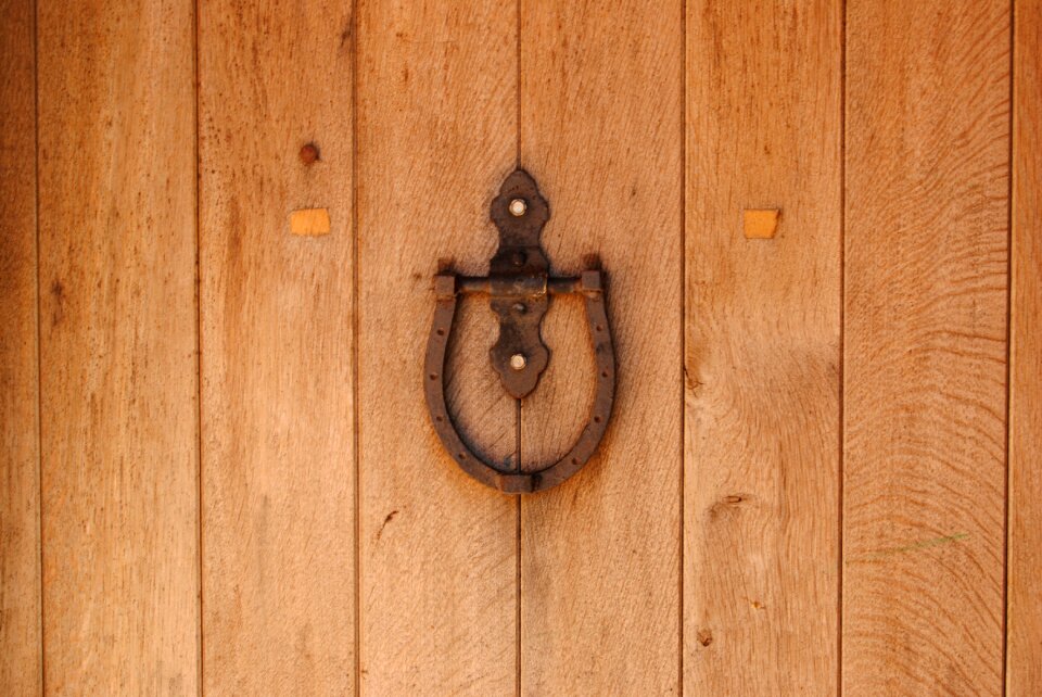Door knocker entrance closed doors