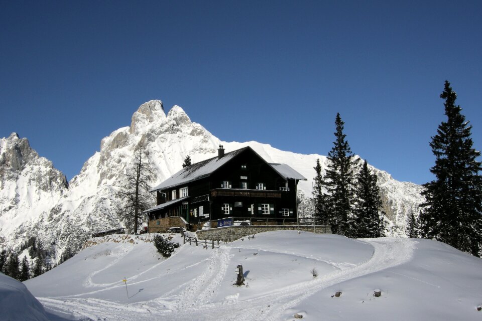 Winter mountain hut hiking tour photo