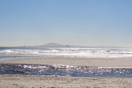 Sky backlighting coast