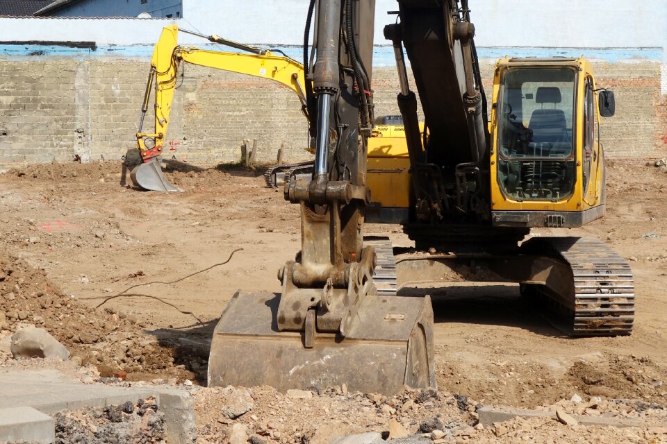 Construction machine backhoe bucket blade