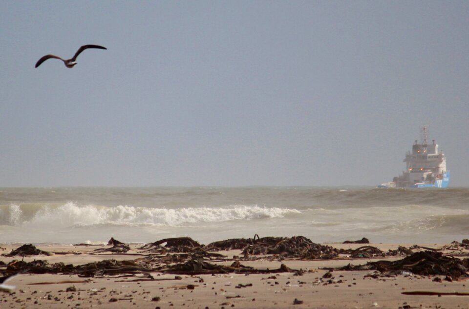 Sea hazy sand beach photo