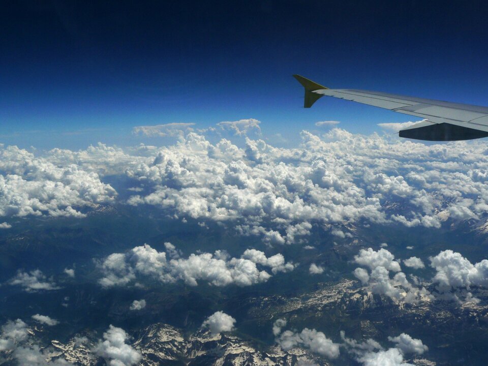 Above the clouds clouds mountains photo