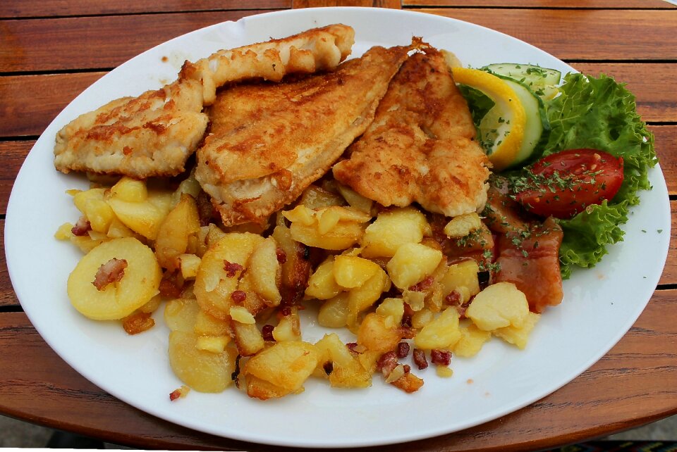 Delicious fried potatoes scholl fillets