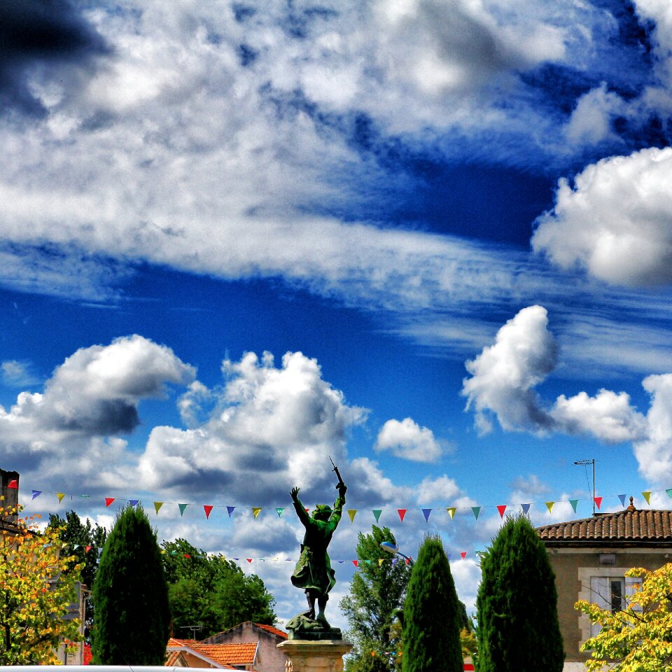 Saint emilion blue sky statue