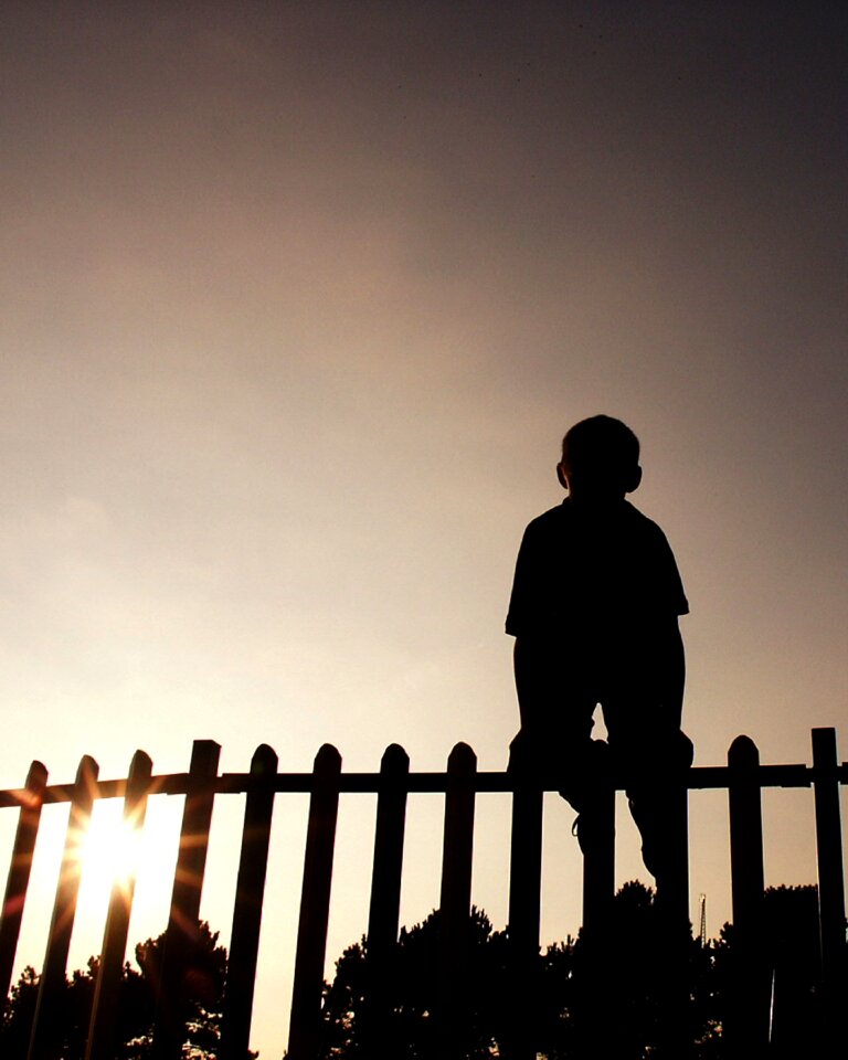Climbing sun silhouette