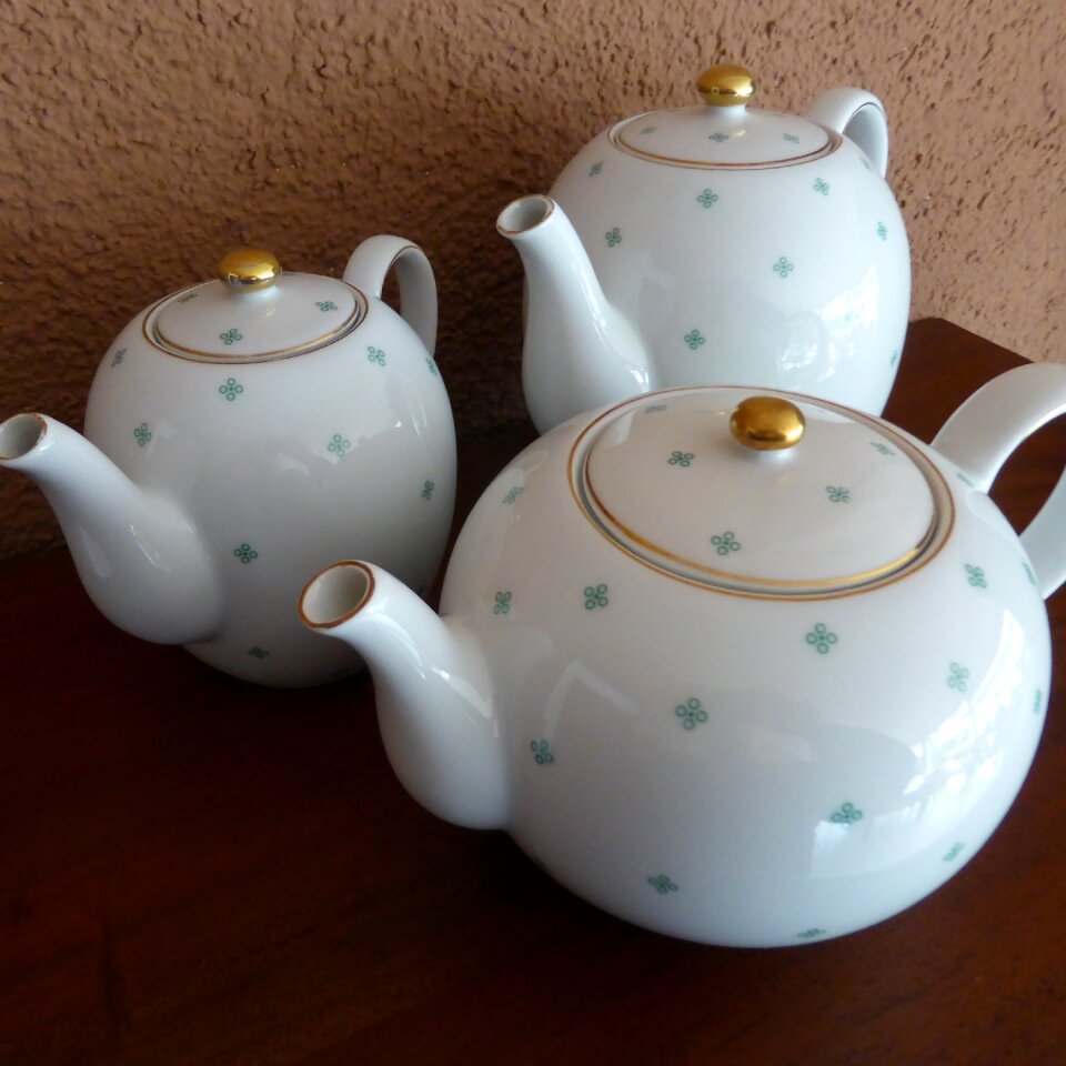 Teapot green white photo