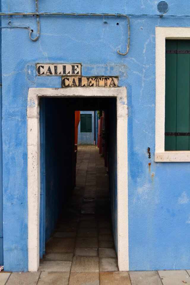 Burano island blue house narrow street
