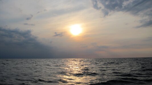 Sail setting sun baltic sea