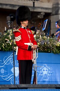 Coronation gala red tunic busby photo