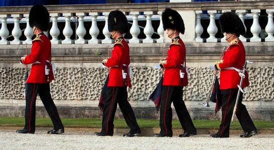 Dress sword marching in line buckingham palace photo