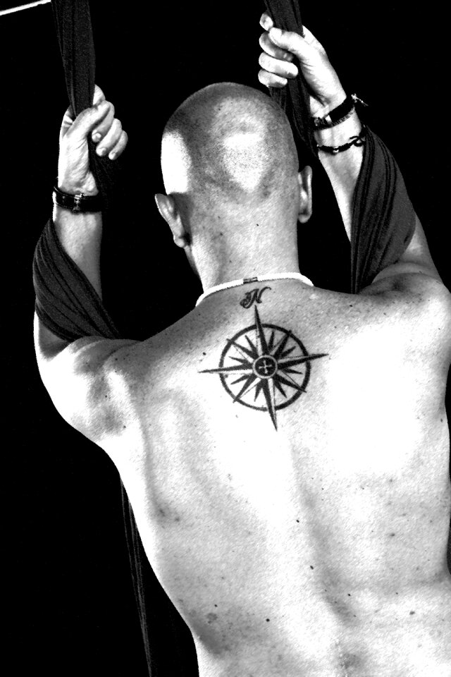 Black and white tattoo star of the winds
