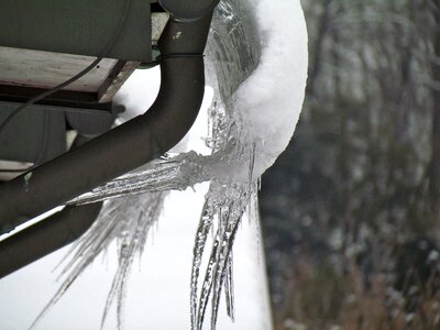 Frozen icicle gutter photo