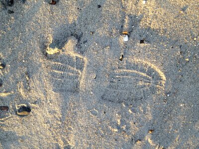 Shoe footprint sand beach photo