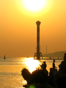 Lighthouse sunset elbe beach photo