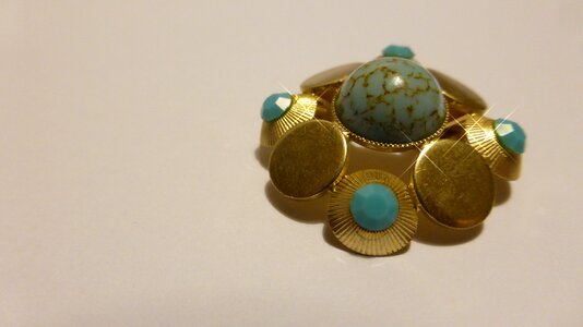 Gold turquoise badges