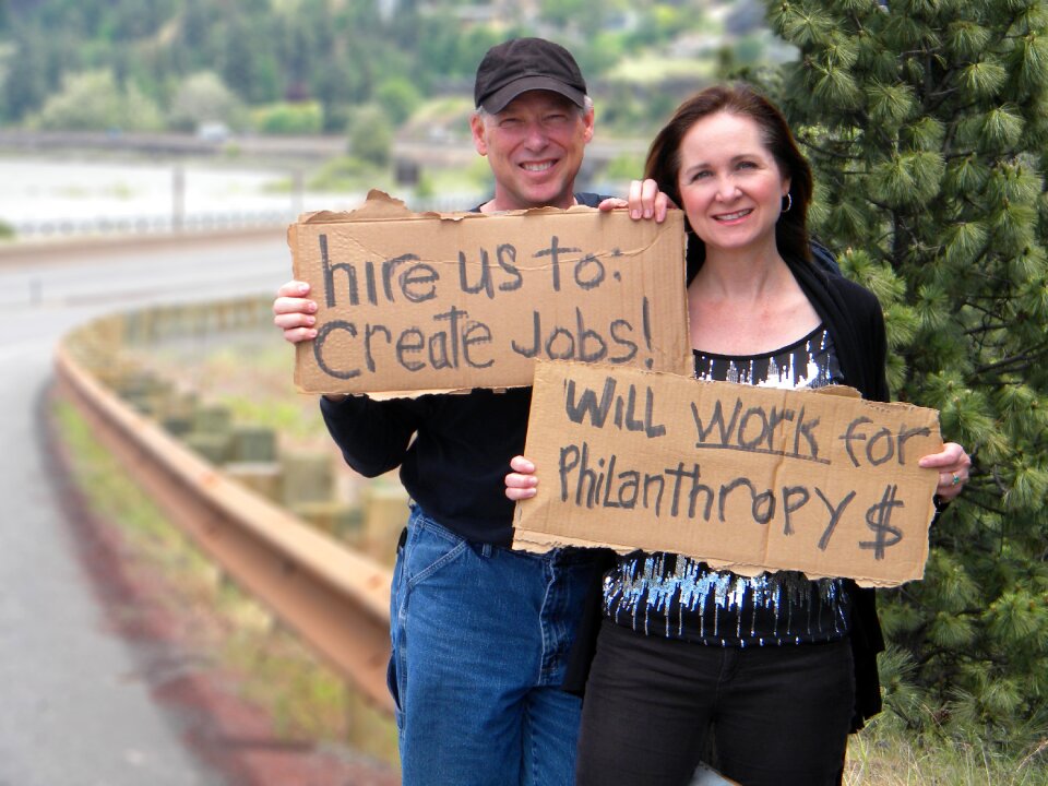 Jobless cardboard signs couple
