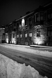 Snow illuminated black and white photo