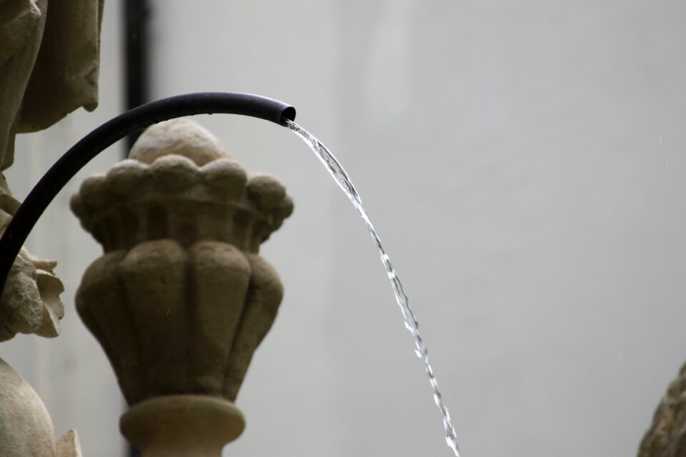 Fountain flow drop of water