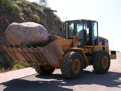 Excavator stone rock